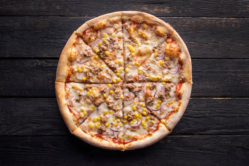 Veggie pizza with fresh colorful toppings