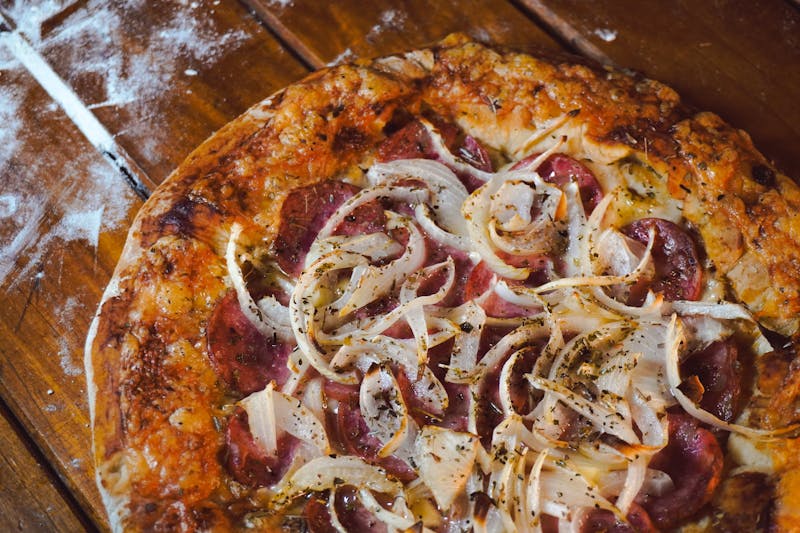 BBQ chicken pizza with caramelized onions