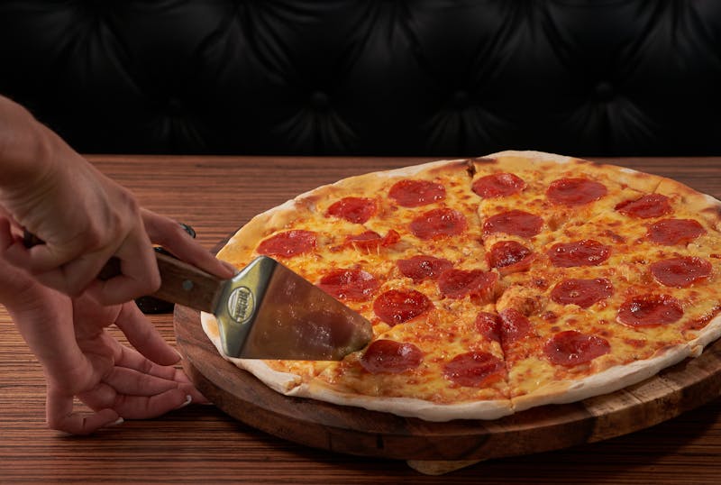 Four cheese pizza with golden crust